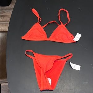 Brand new orange suit from pacsun.